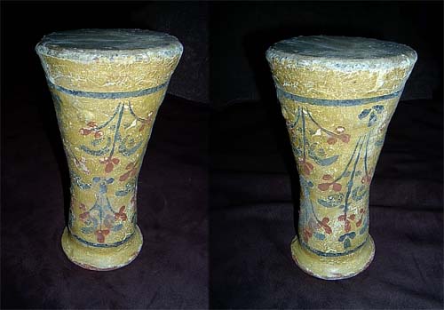 [IMAGE: ancient doumbek drum photo]
